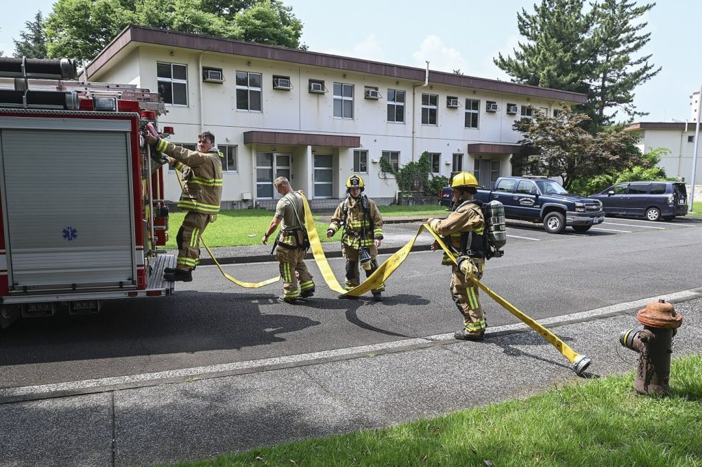 Firefighters Train for the Buildings They Actually Face firefighters during a training exercise