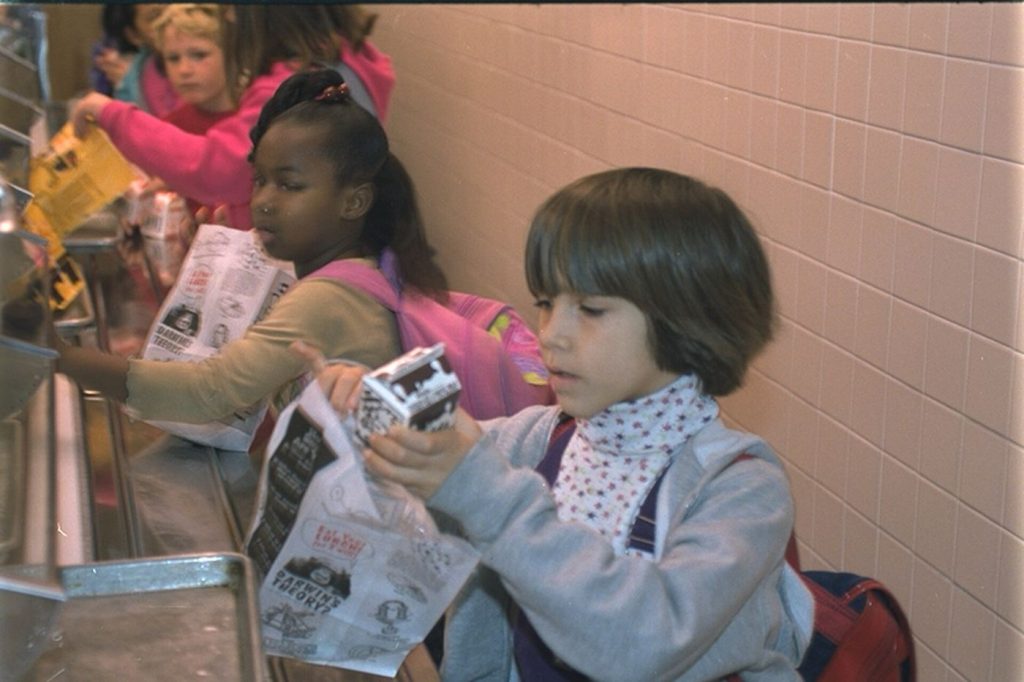 Schools Lengthen Lunchtimes So Children Can Eat Properly children eating lunch in a school cafeteria