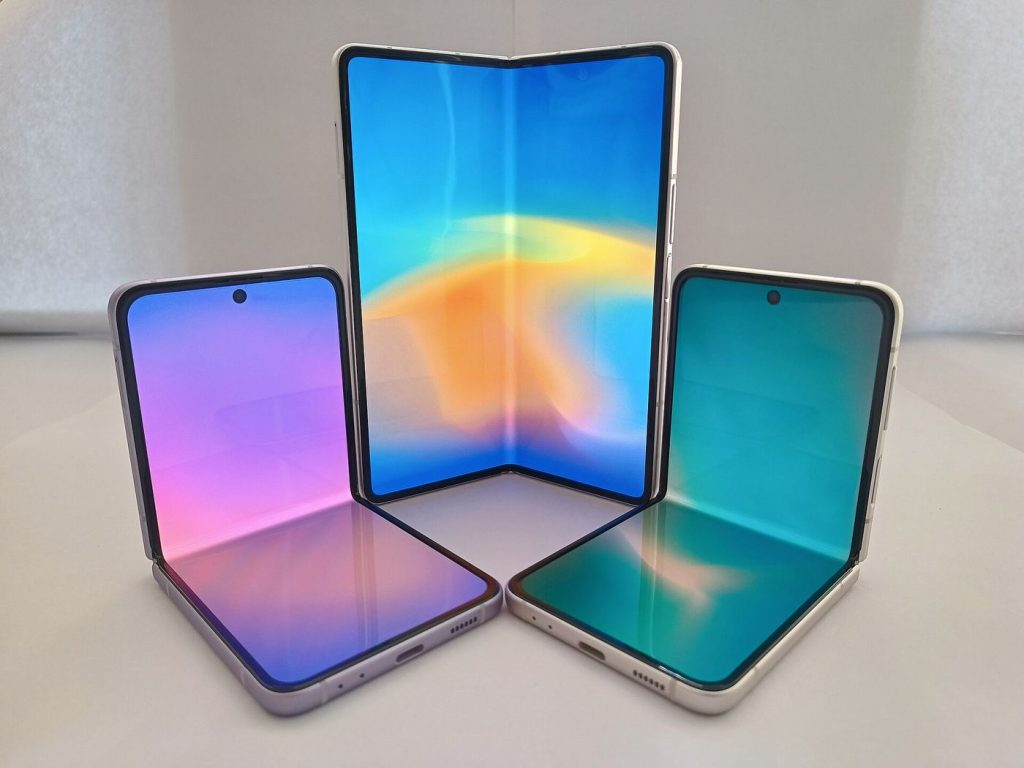 Foldable Phones Finally Grow Up Photograph of a foldable smartphone held open in a person's hand.